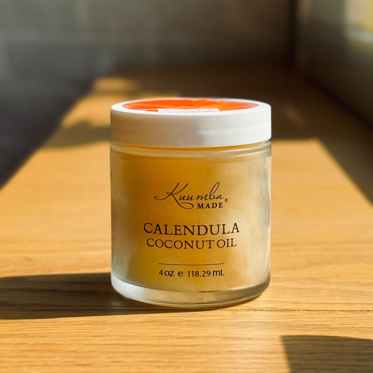 WhatsApp Image 2024-08-29 at 2.24.01 PM (9) Kuumba Made,  Coconut Oil - Calendula (118 ml) - Image 1